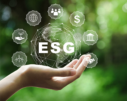 BOMA BEST - A hand holds a transparent globe with icons symbolizing real estate sustainability, environmental, social, and governance (ESG) concepts, surrounded by a lush green background.